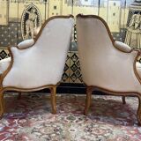 Paire de fauteuils bergères gondoles de style Louis XV