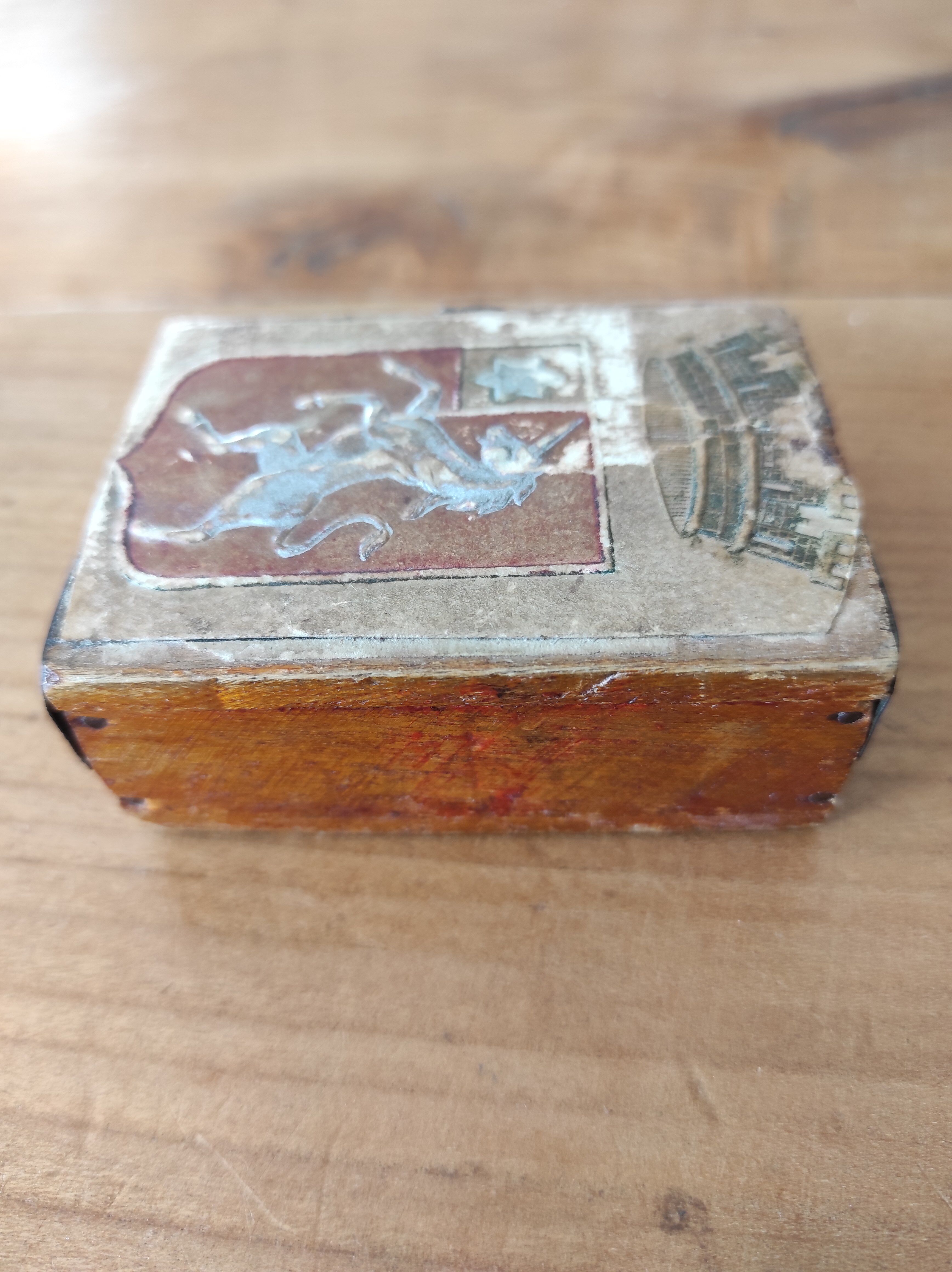 Wooden box decorated badge and unicorn