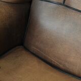 Sheepskin wingback armchair with beautiful colours in good condition