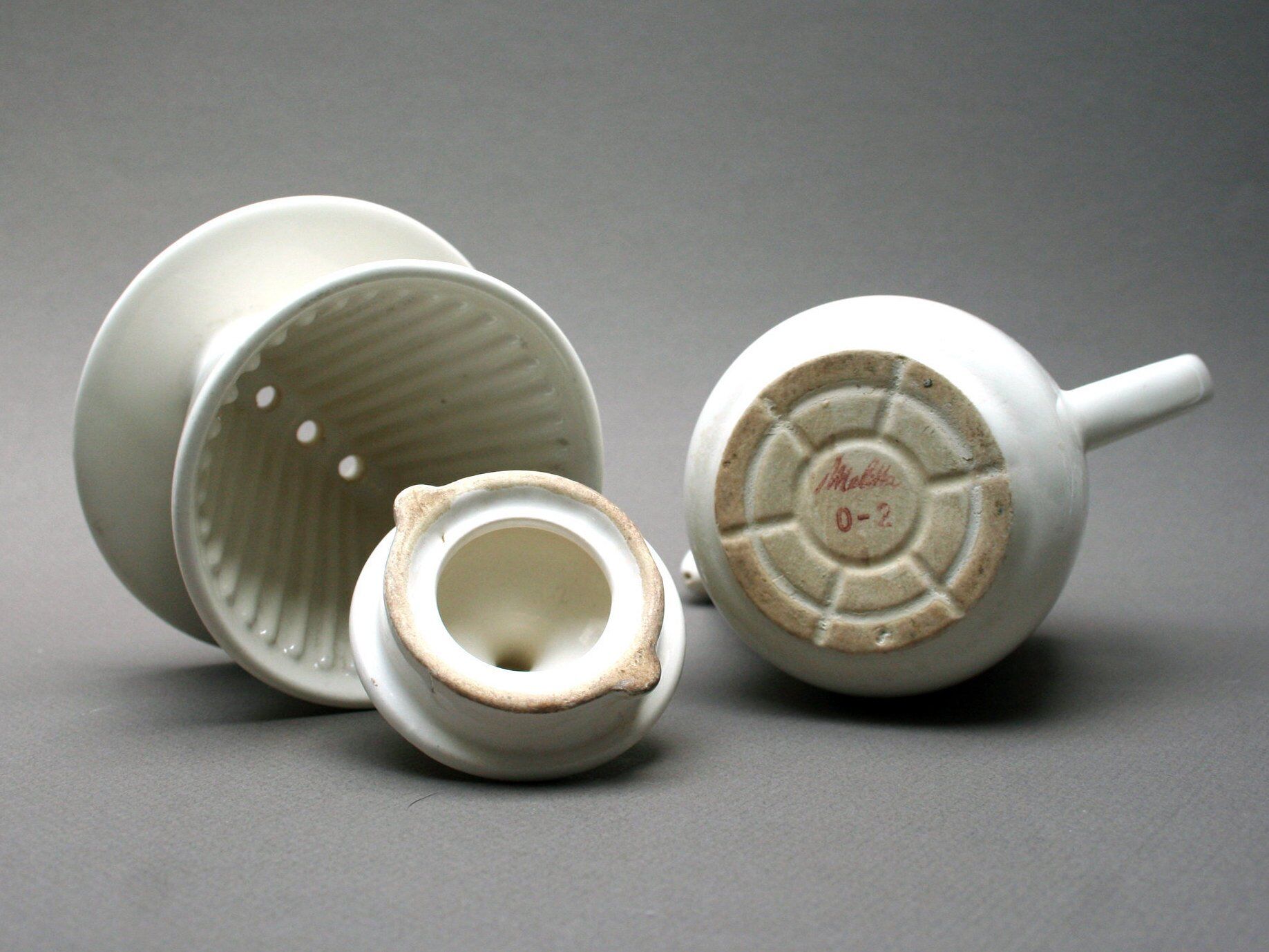 White ceramic coffeemaker and melitta filter, 60 years
