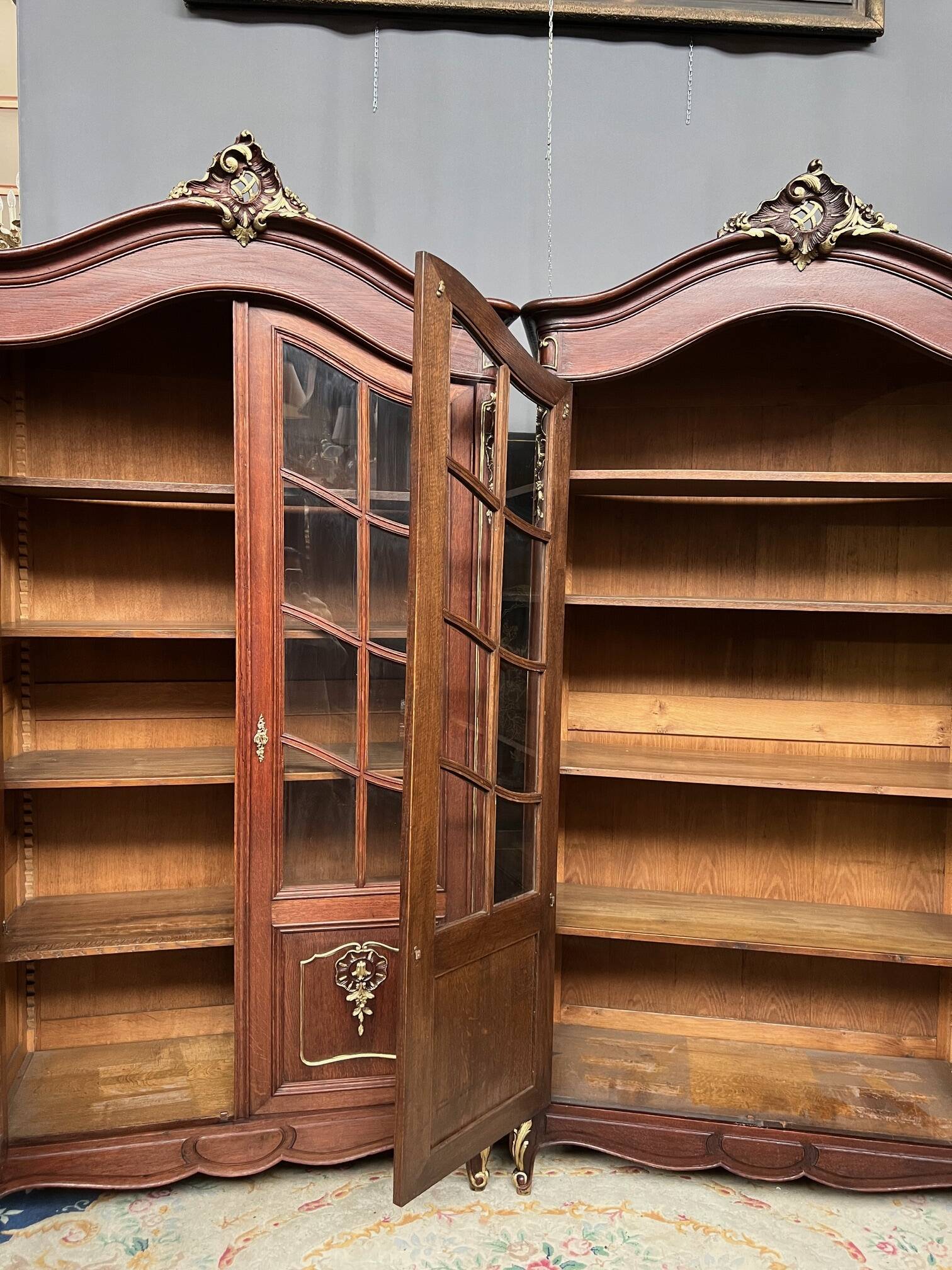 Pair of Louis XV style display cabinets. Hand-painted in gold, carved from solid oak.