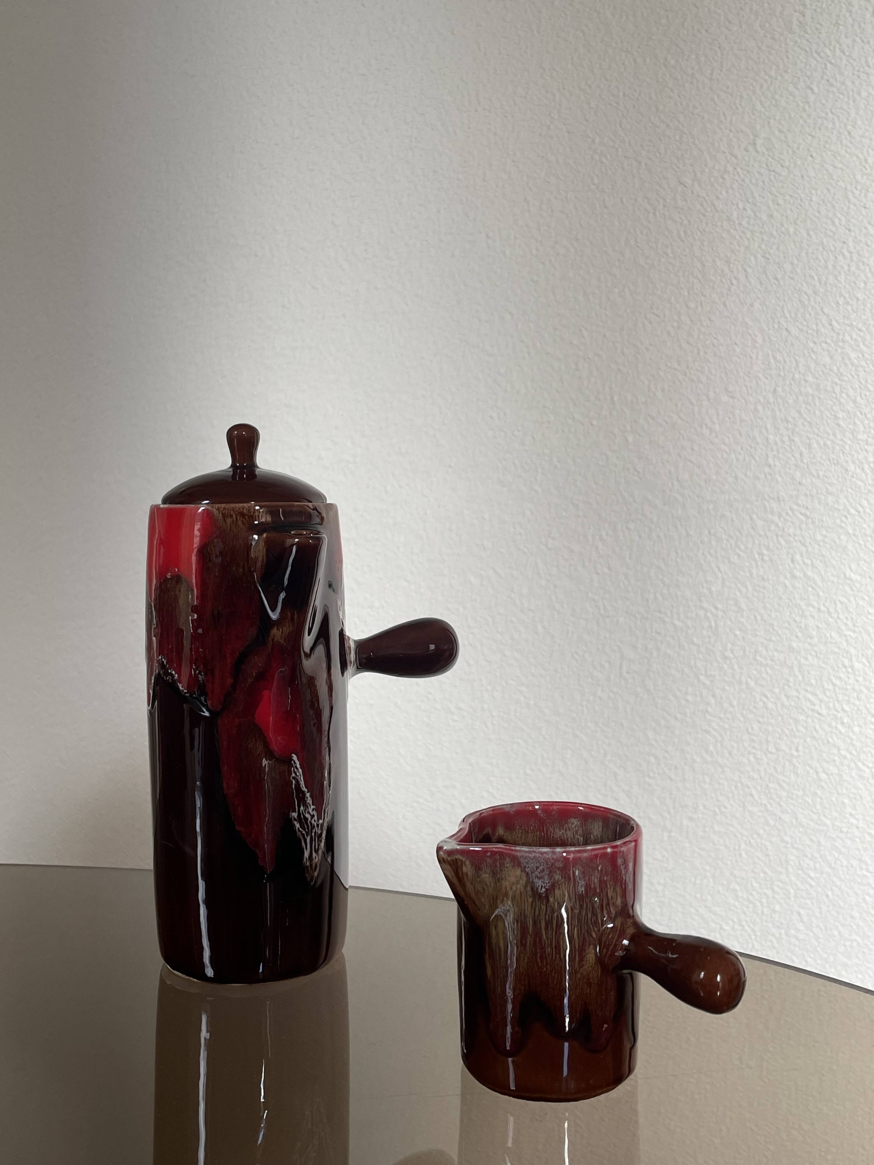 Ceramic teapot and milk jug