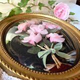 Oval frame domed glass curved roses