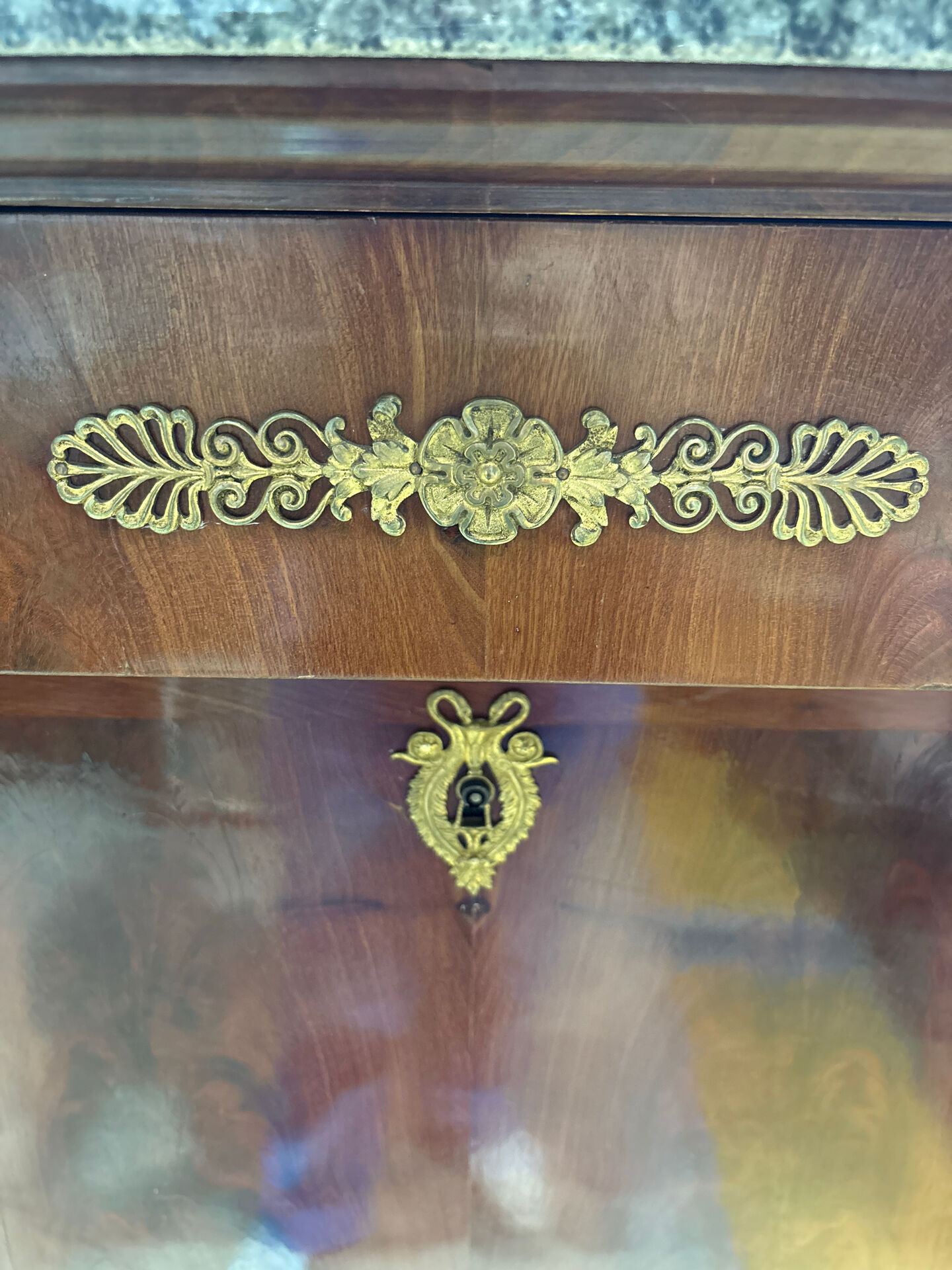 Empire secretary in mahogany, bronze and marble with secret drawers.