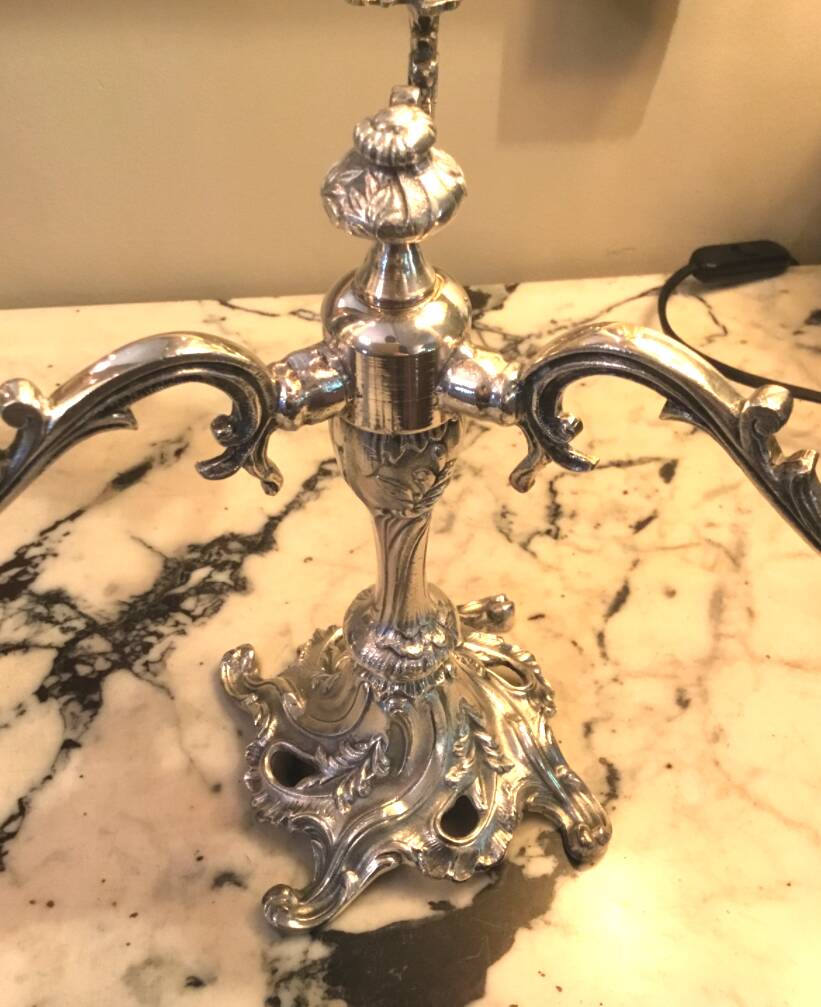 Pair of three-armed silver-plated metal candelabras