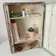 Vintage metal medicine cabinet from the 1950s