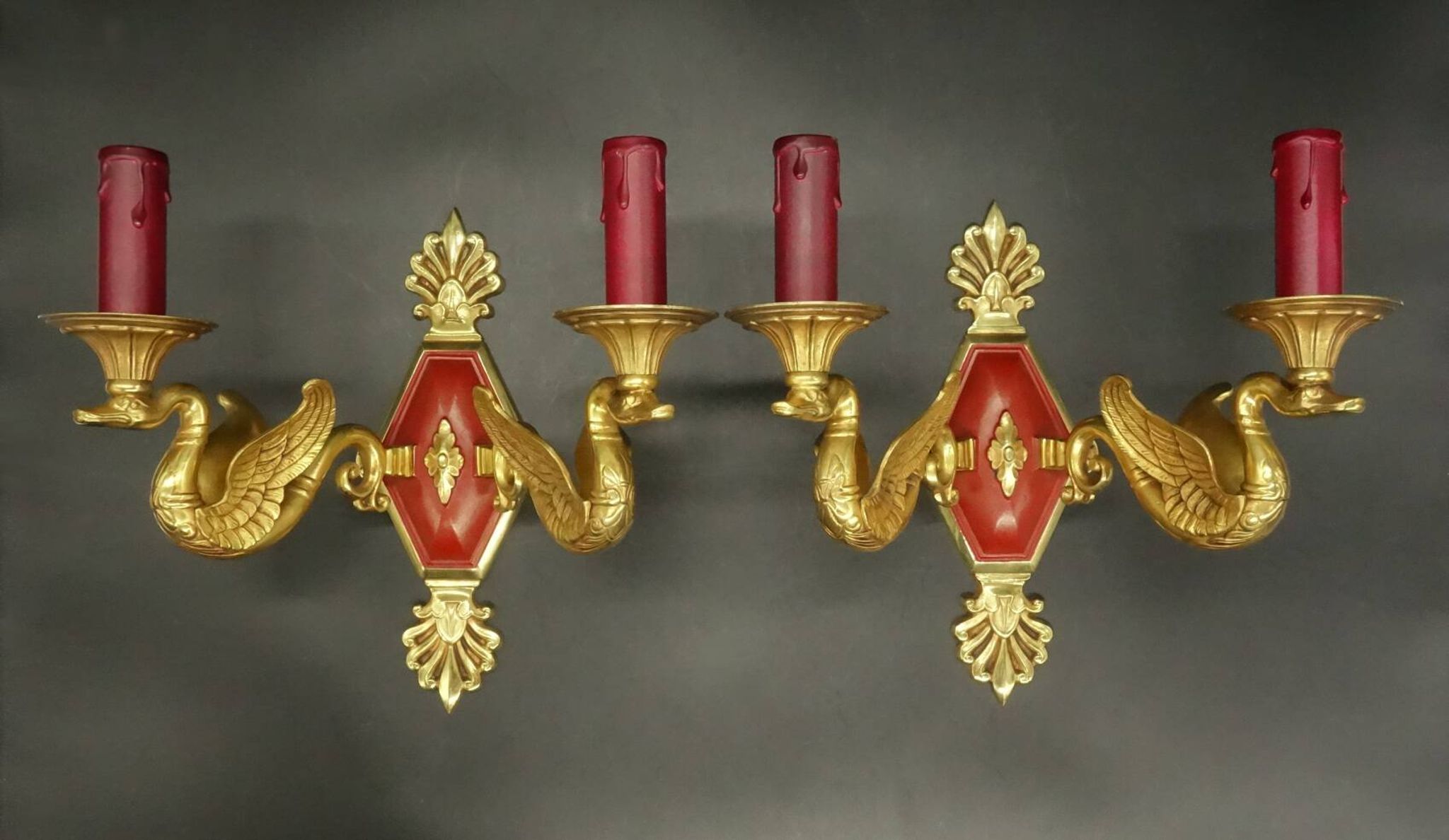 Pair of Empire style wall sconces with swans from Petitot - bronze & bordeaux patina.
