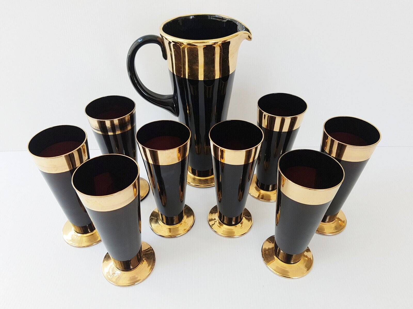 Vintage 1950s black and gold glass lemonade service.