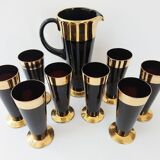 Vintage 1950s black and gold glass lemonade service.