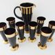 Vintage 1950s black and gold glass lemonade service.