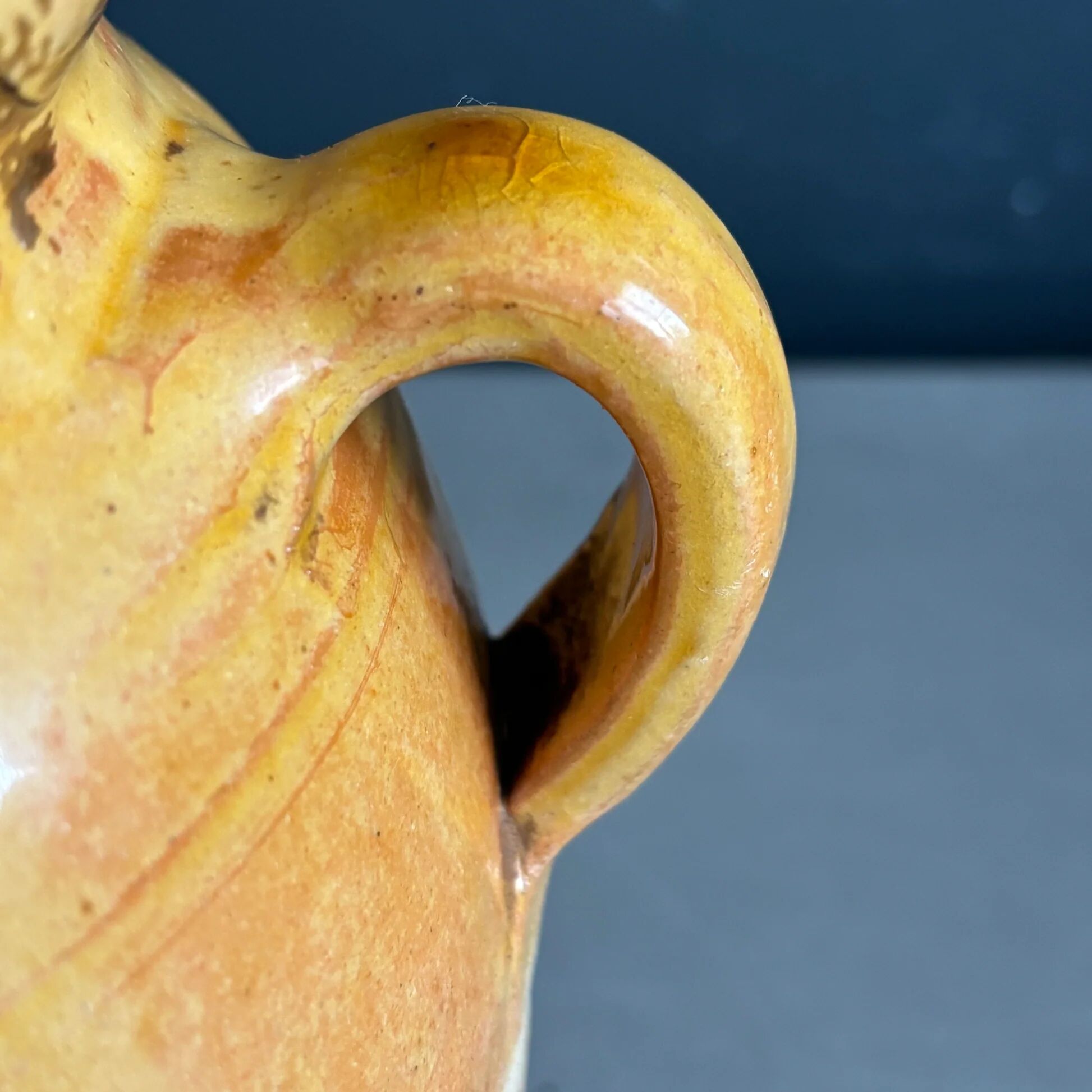 Ancient oil jar in glazed terracotta
