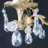 Pair of gilded bronze sconces and crystal pendants
