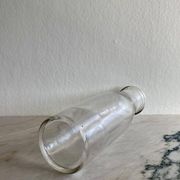 Bouteille de lait, vase