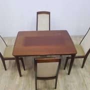 Table and four chairs set, brown wood, beige fabric, Denmark, 1970s.
