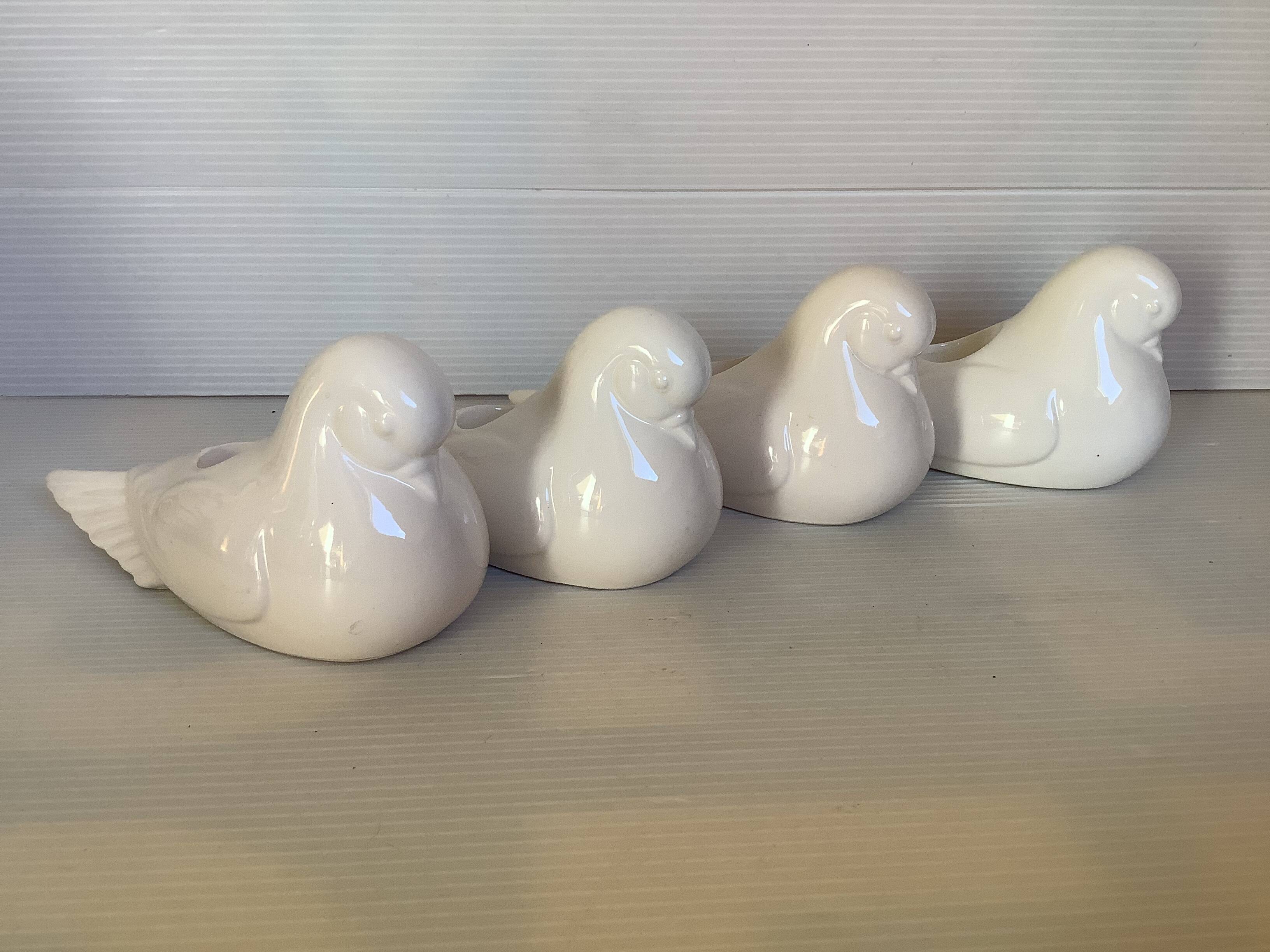Seven dove bird candle holders