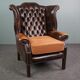 Chesterfield armchair with armrests