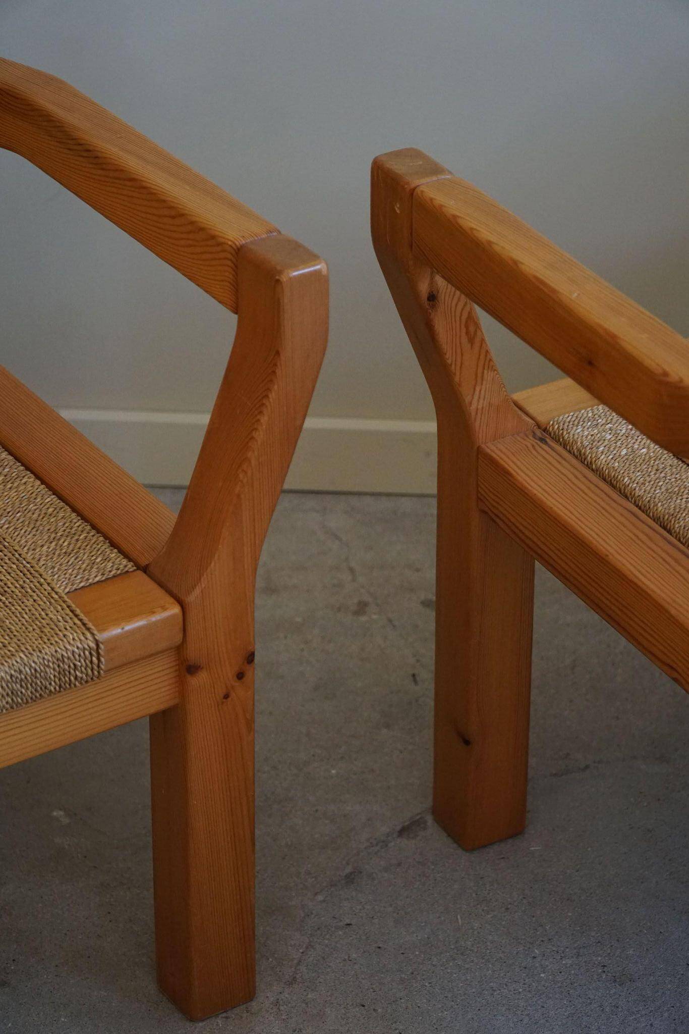 Tage Poulsen, a pair of brutalist chairs in pine and cord, Danish modern style, 1970s.
