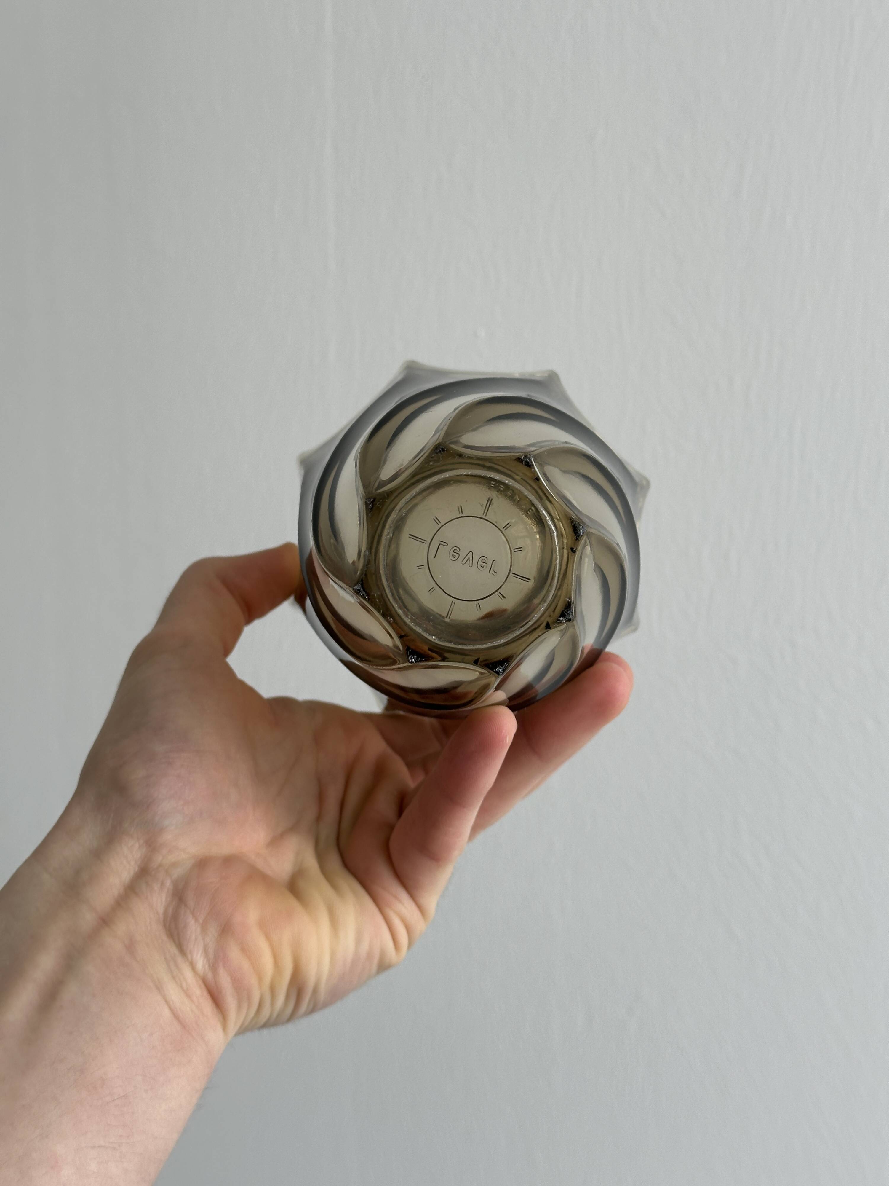 Smoked glass vase with twisted design