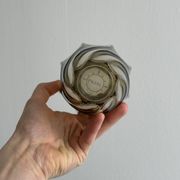 Smoked glass vase with twisted design