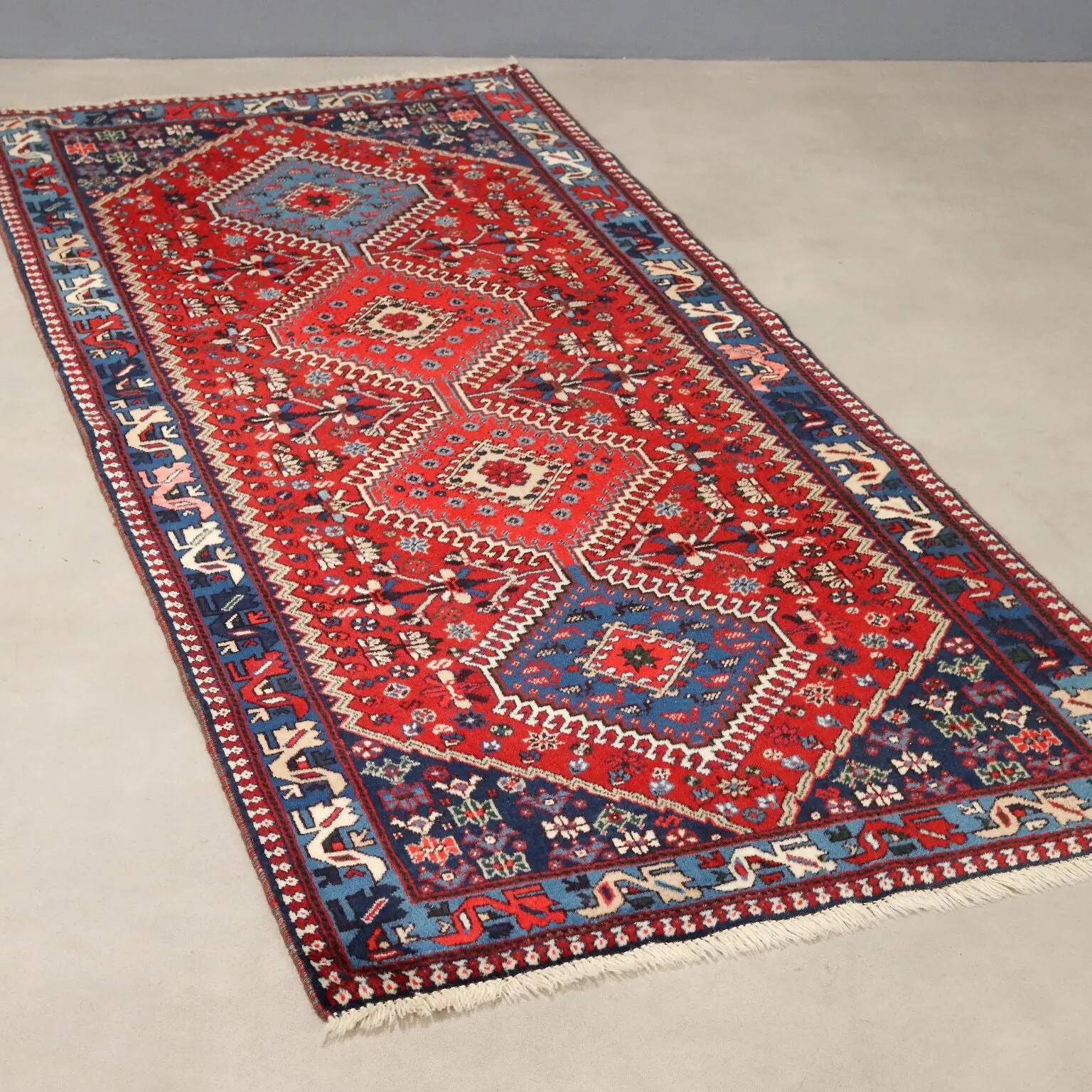 Ancient Asian wool rug, hand-knotted, 79 x 34 in.