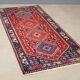 Ancient Asian wool rug, hand-knotted, 79 x 34 in.