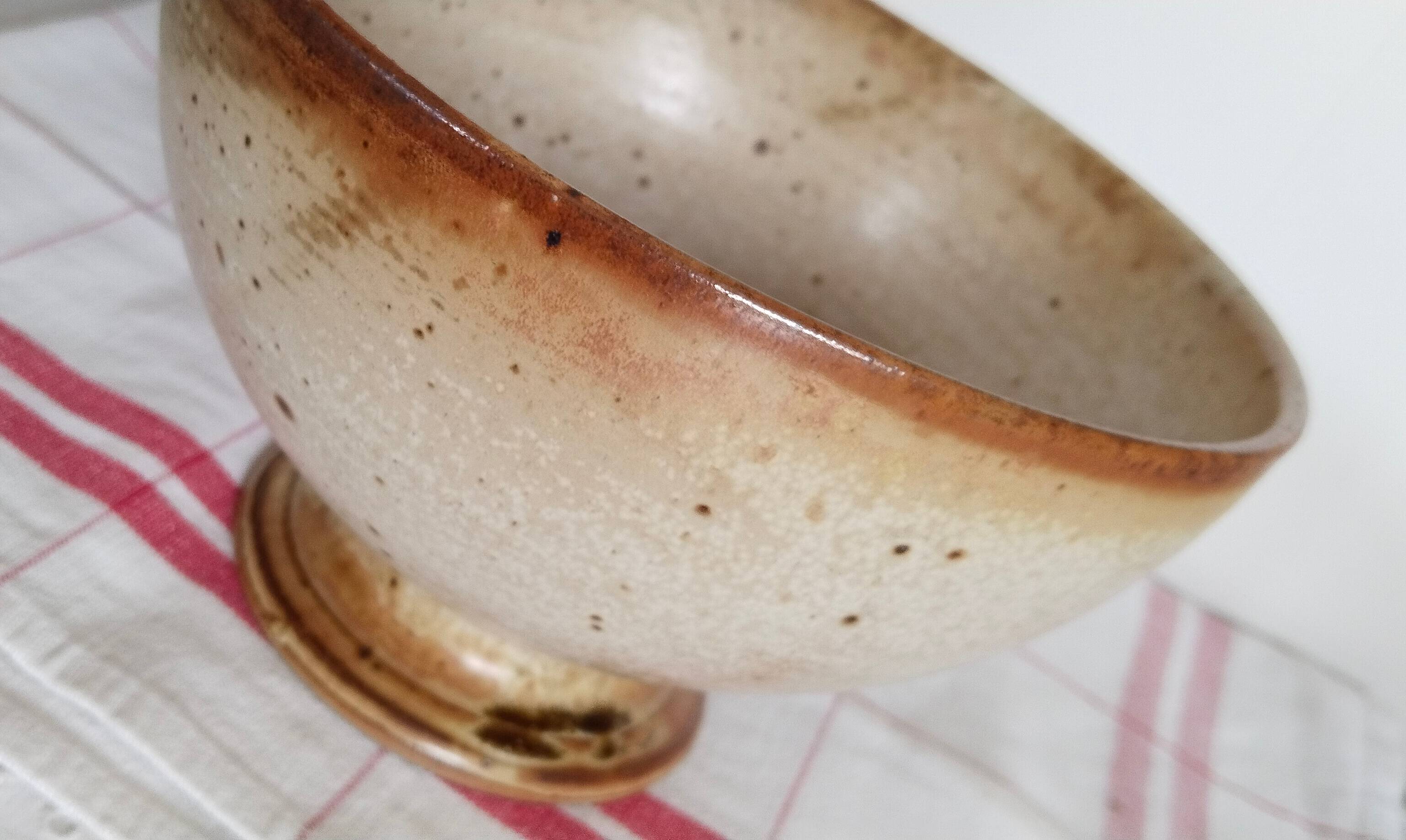 Large handmade stoneware bowl with foot