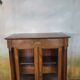 Small Empire library in cherry wood.