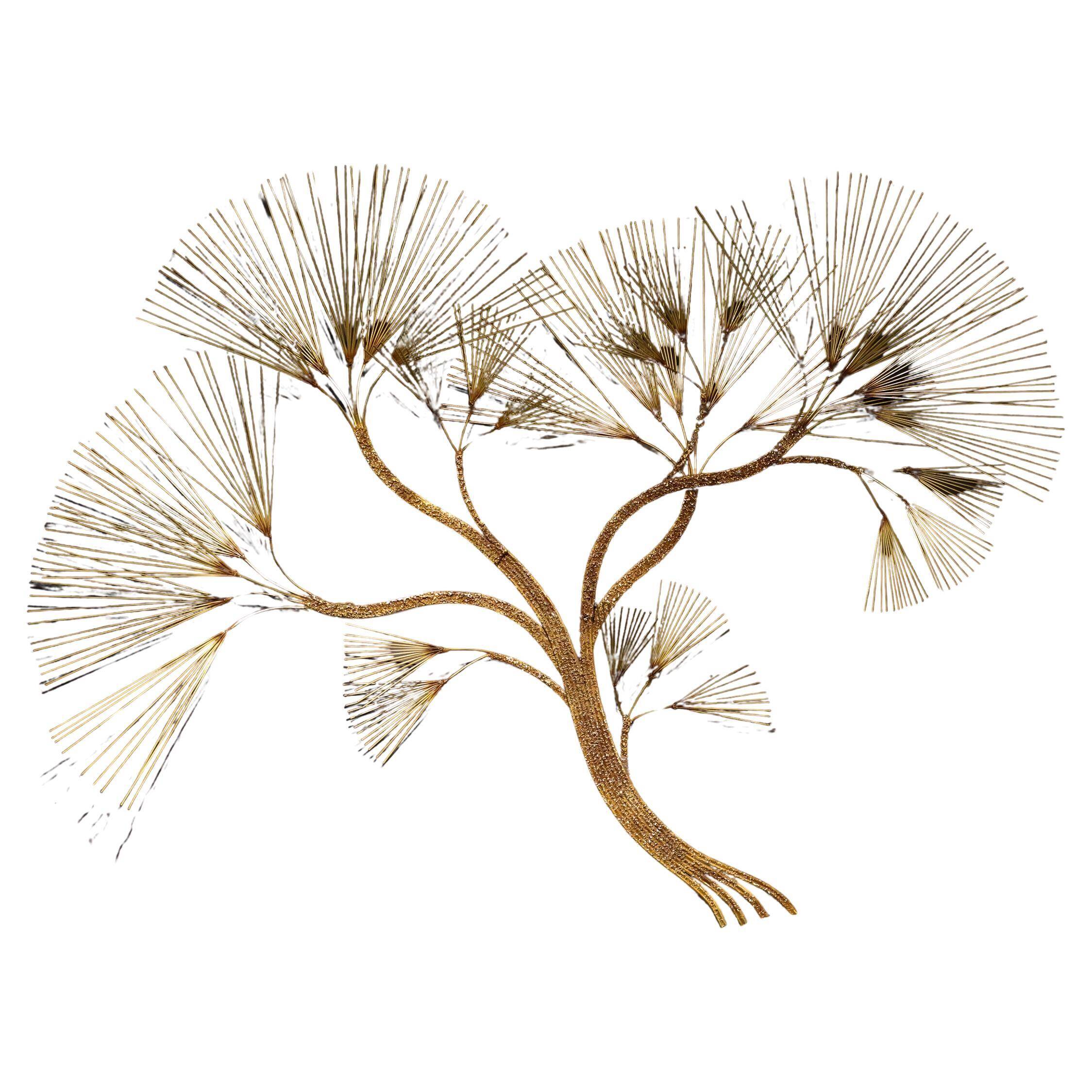 Large wall sculpture in the shape of a tree needle in brass by Curtis Jeré, mid-century modern.