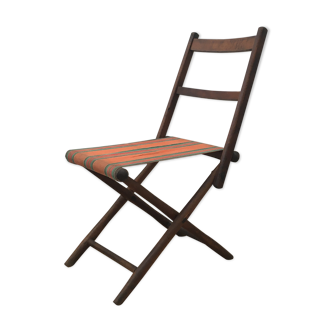 Antique folding chair in wood and fabric