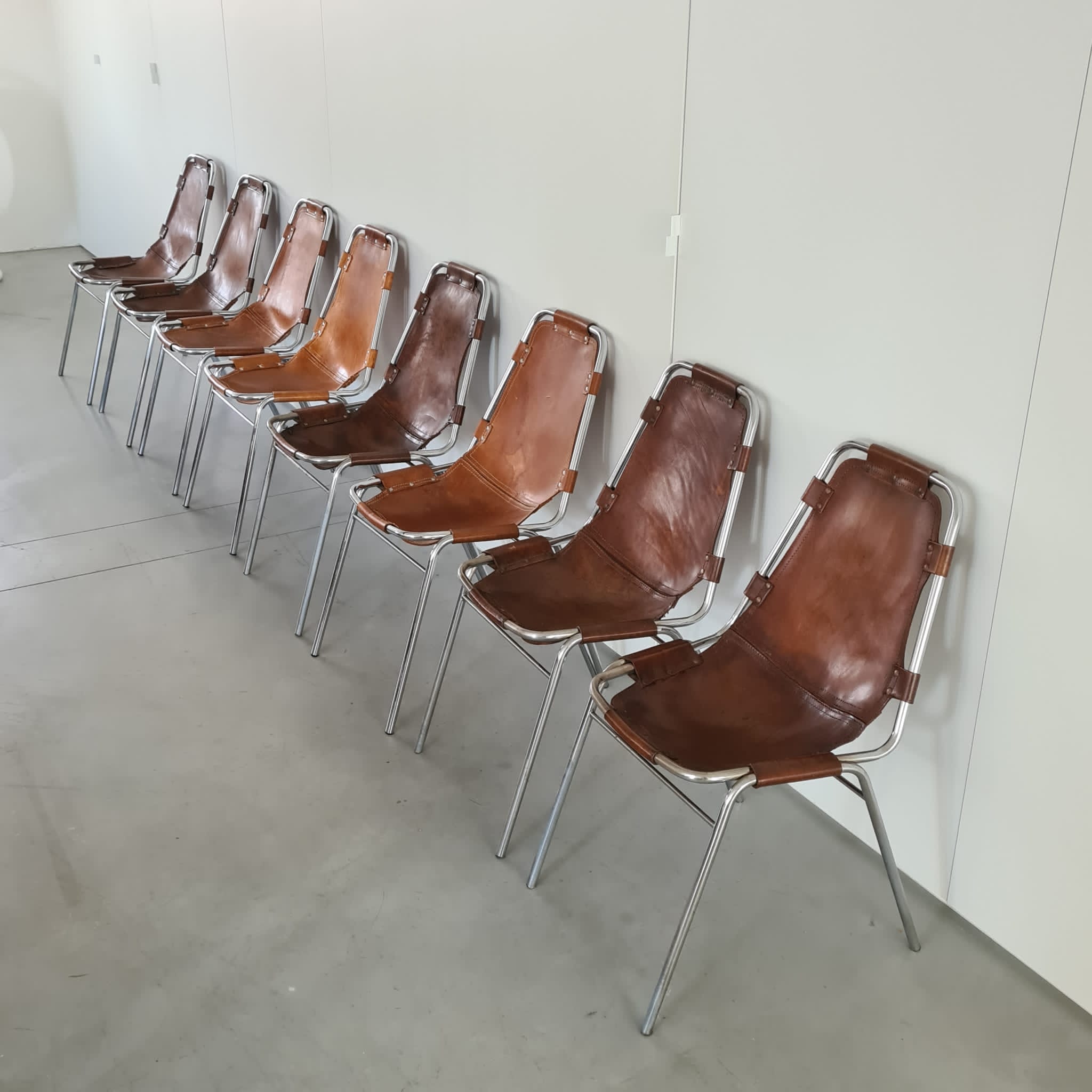 Set of eight mid-century leather dining chairs