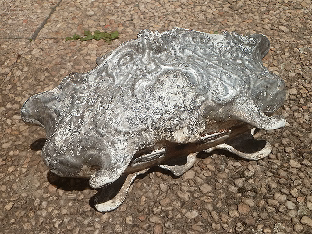 old cast iron planter