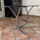 Oval table. 1970. Steel and smoked glass. 180x100