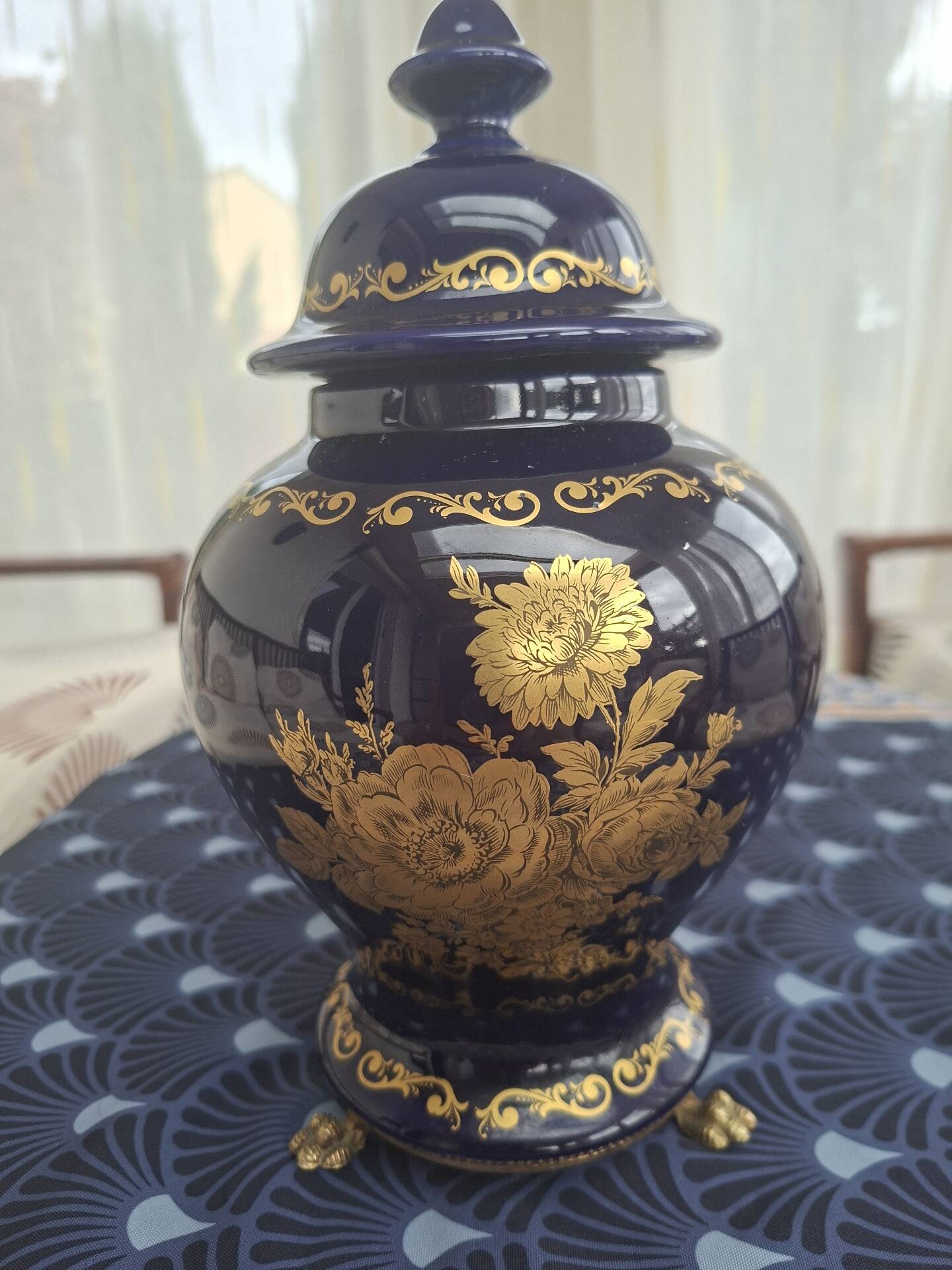 Cobalt blue porcelain bonbonnière with gold decoration on feet.