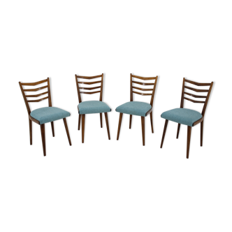 Ensemble de quatre chaises à manger années 1960.