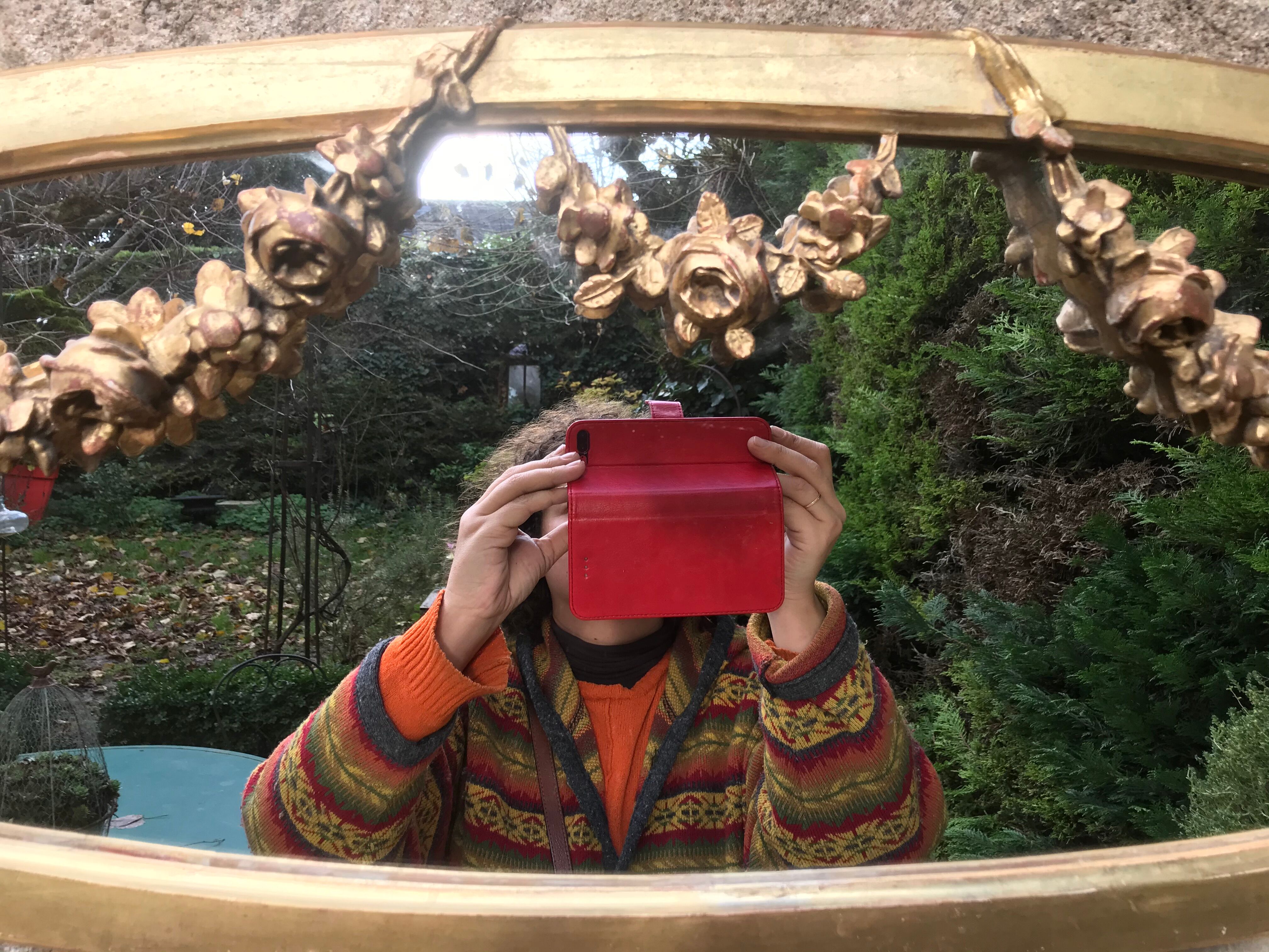 Golden oval mirror with gold leaf 106 x 38 cm