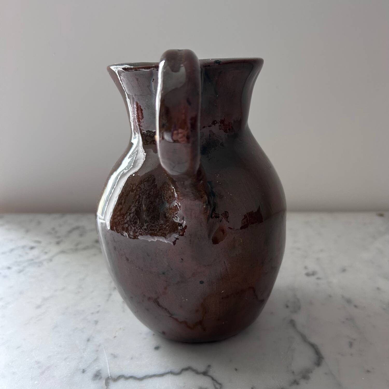 Old signed artisanal pitcher