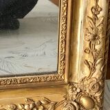 Miroir ancien à moulures dorées