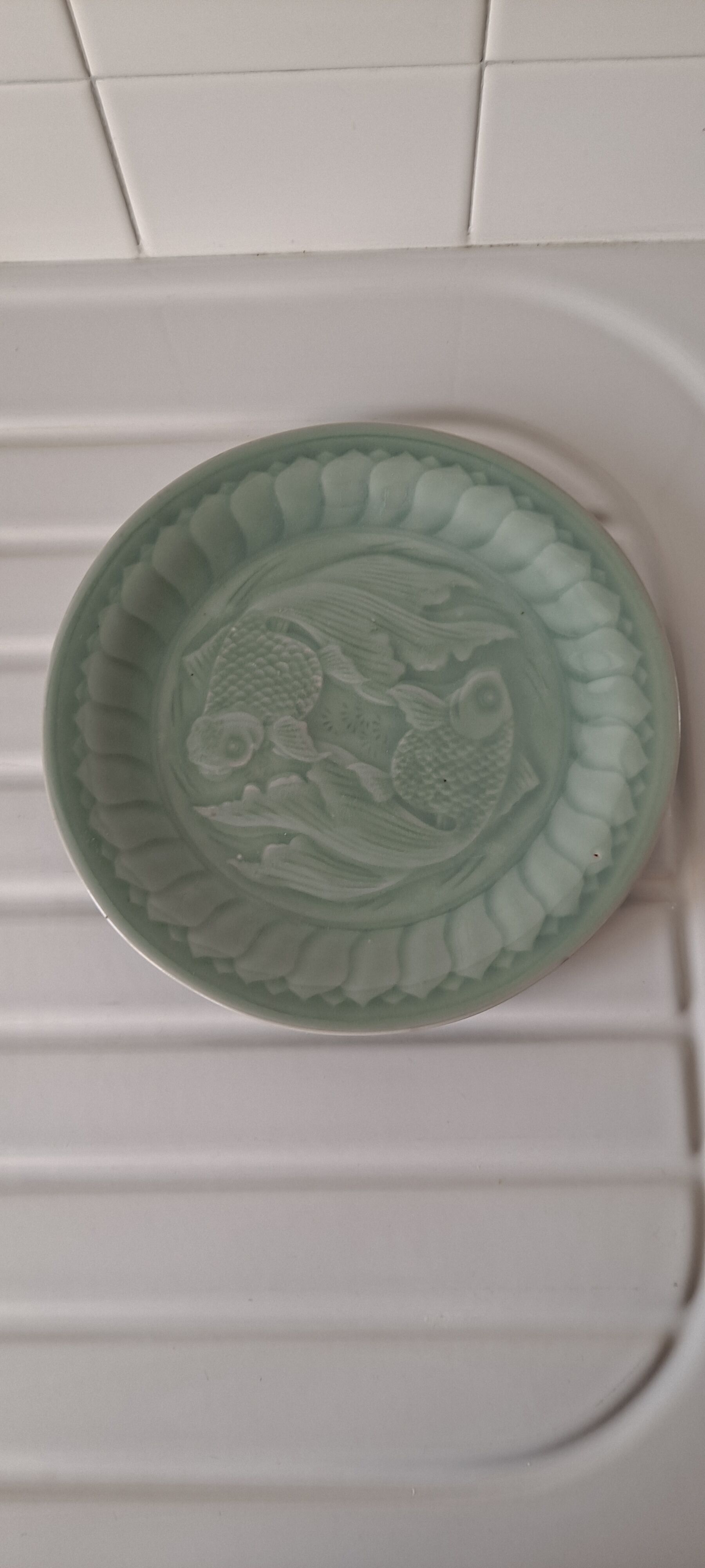Celadon green plate with fish