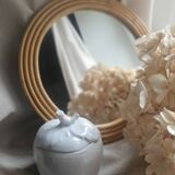 Round rattan mirror