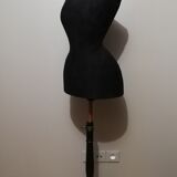 Old bust of seamstress called "wasp size"