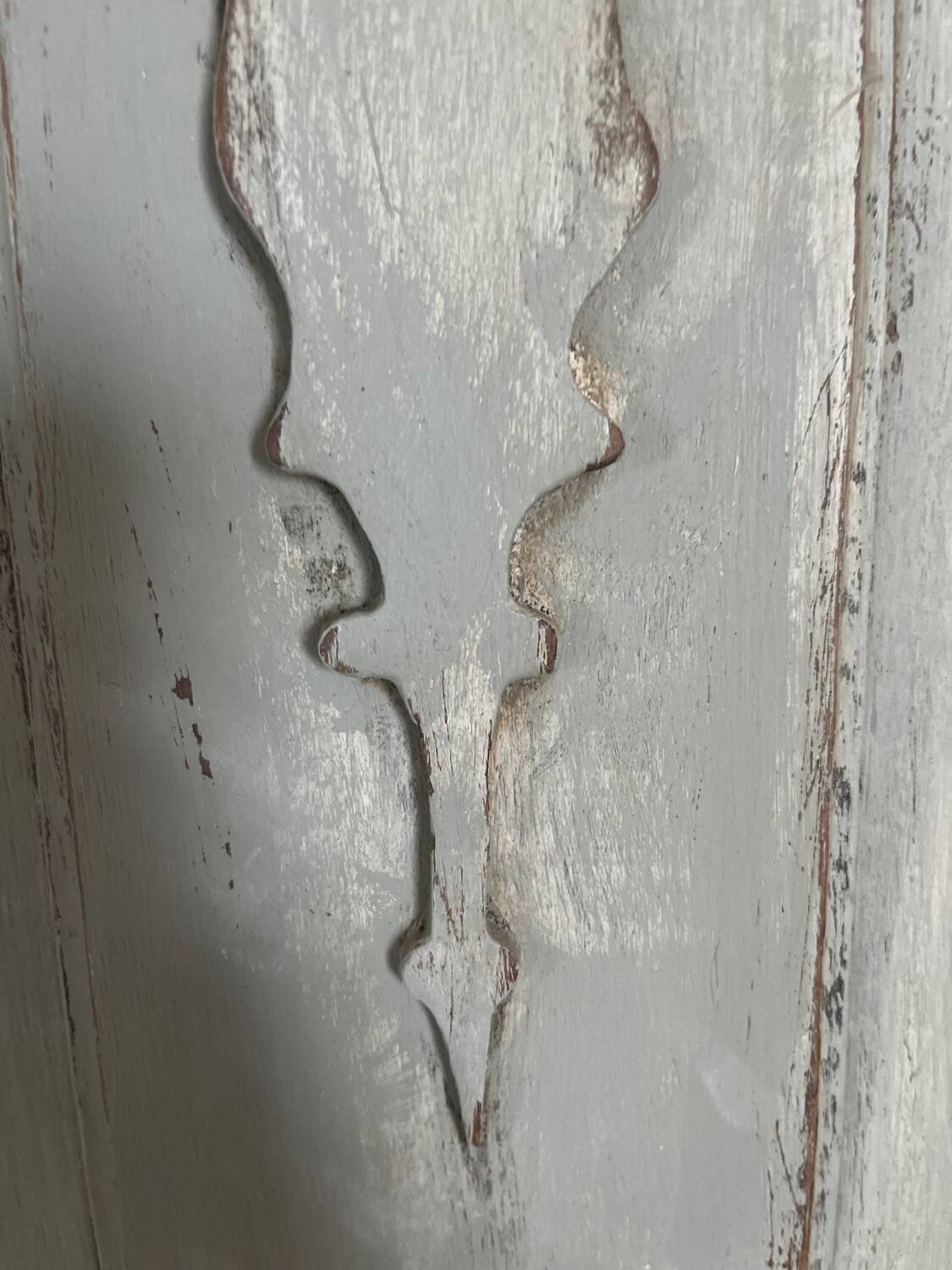 Old-fashioned patinated wooden pediment