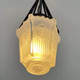 Hanging lamp in wrought iron and pressed molded glass, art nouveau