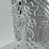 Glass vase with stylized flower pattern