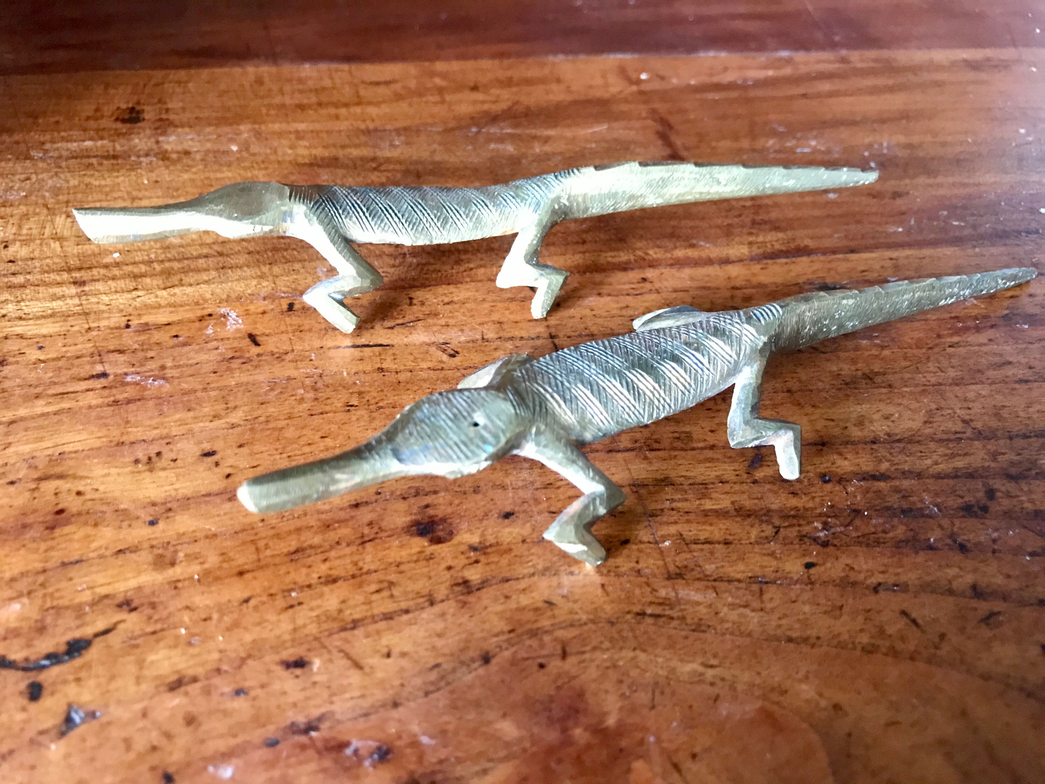Couple of brass alligators