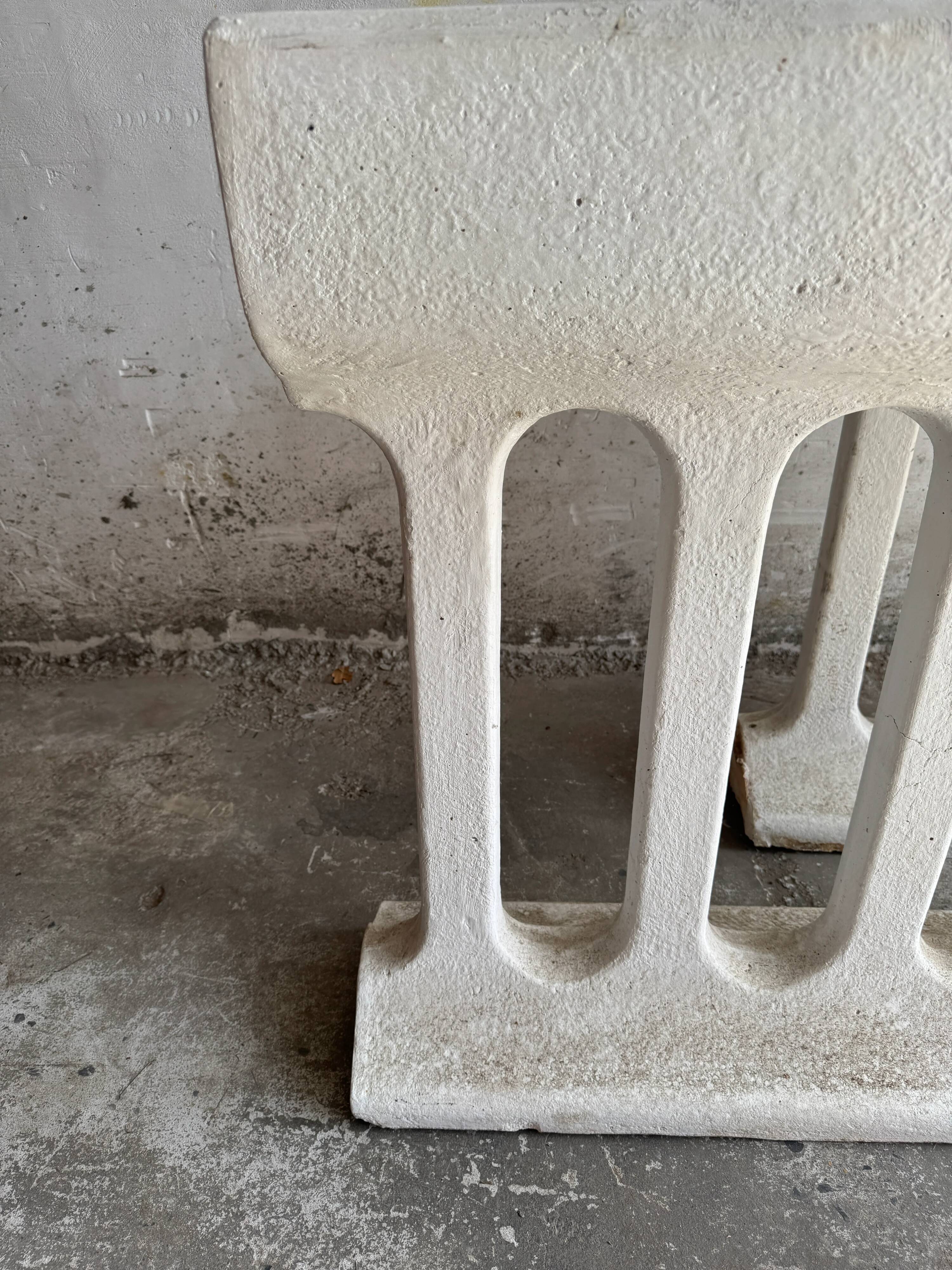 Pair of sculptural cast concrete planters in Off-White, mid-century brutalist style, long and rectangular.