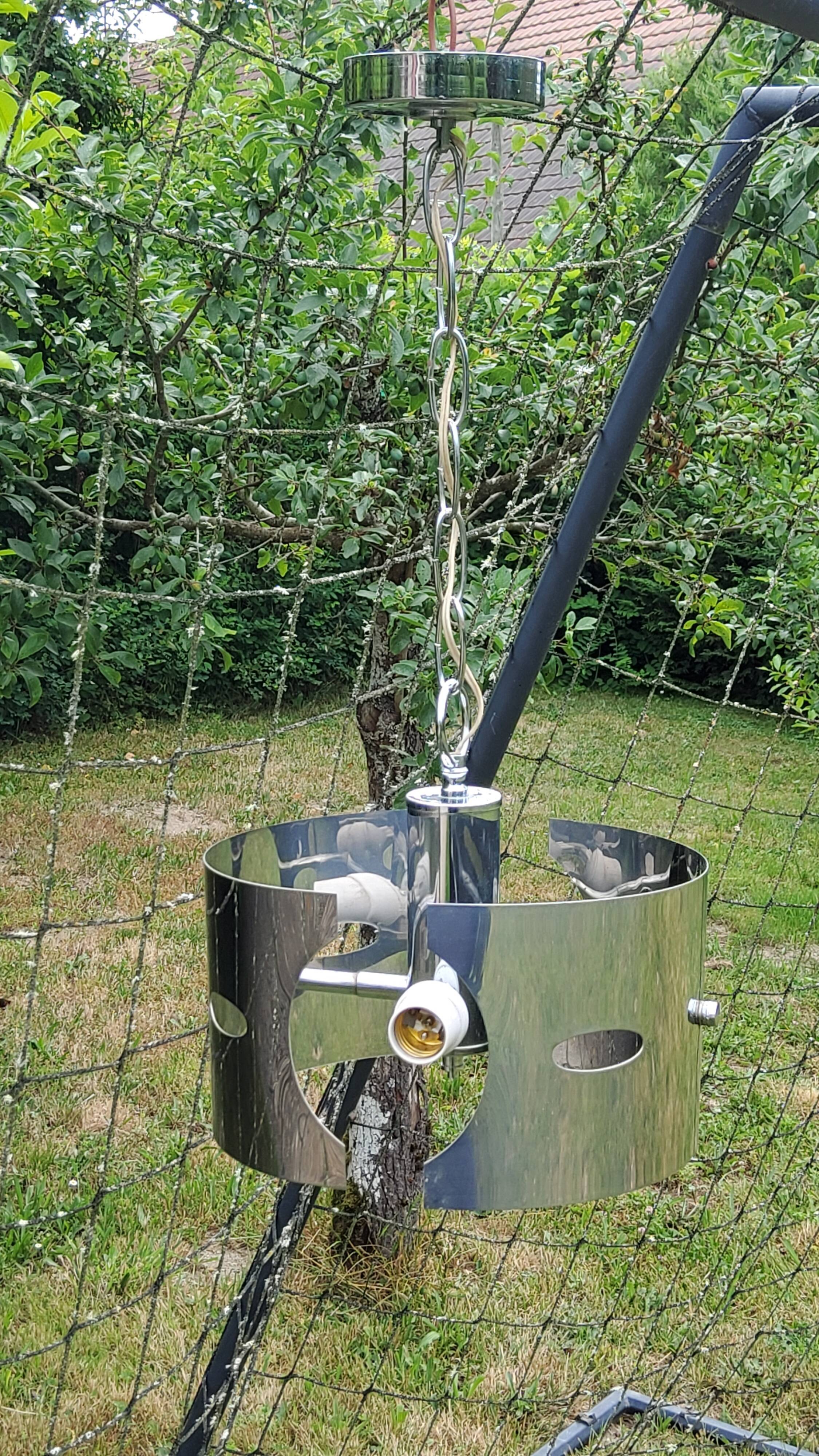 Design chandelier of the 70s in chromed metal