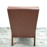 Vintage armchair in wood and imitation leather