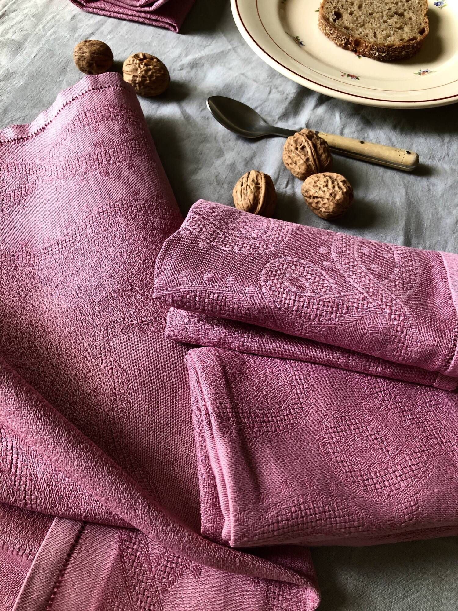Set of four old damasked towels dyed cyclamen