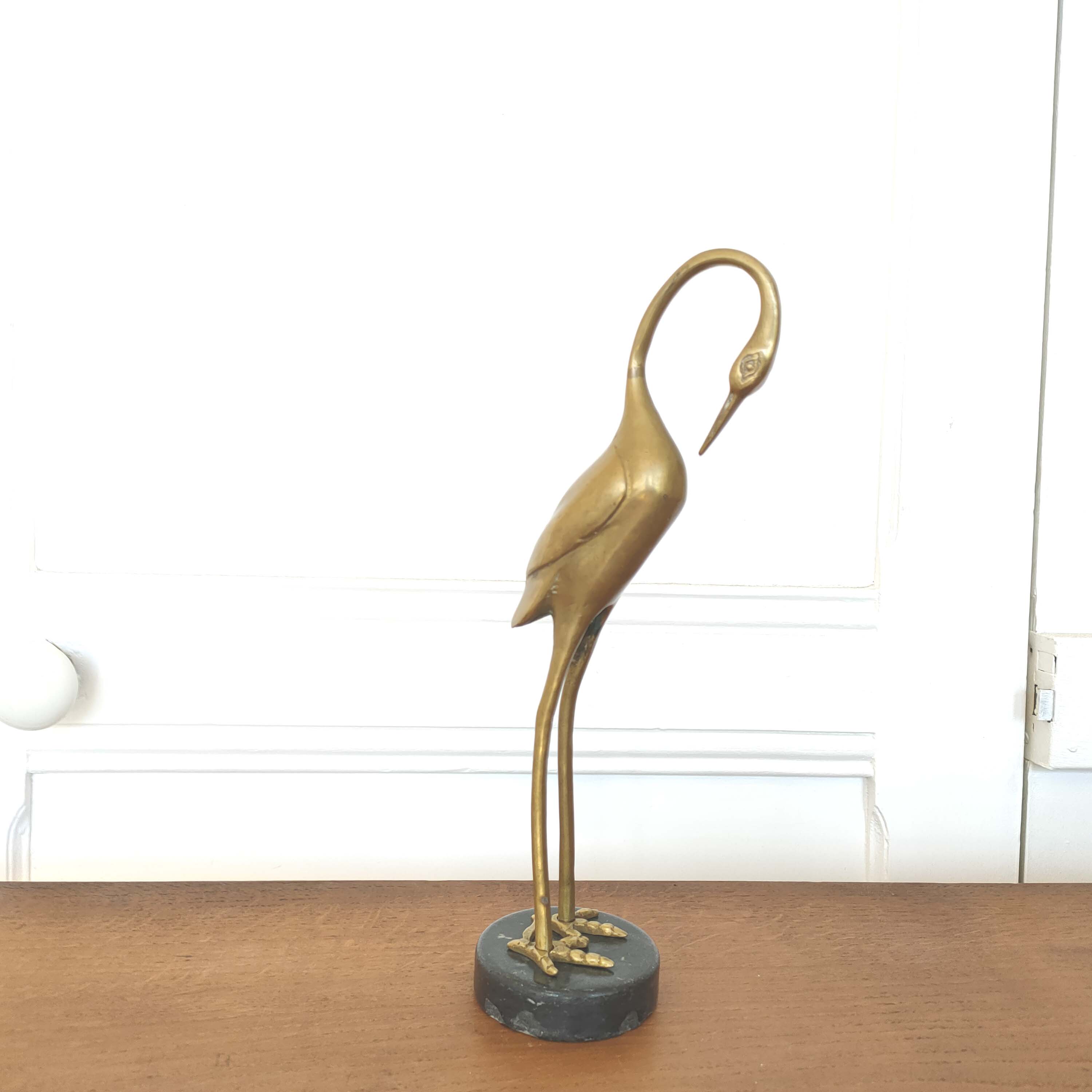 Brass heron