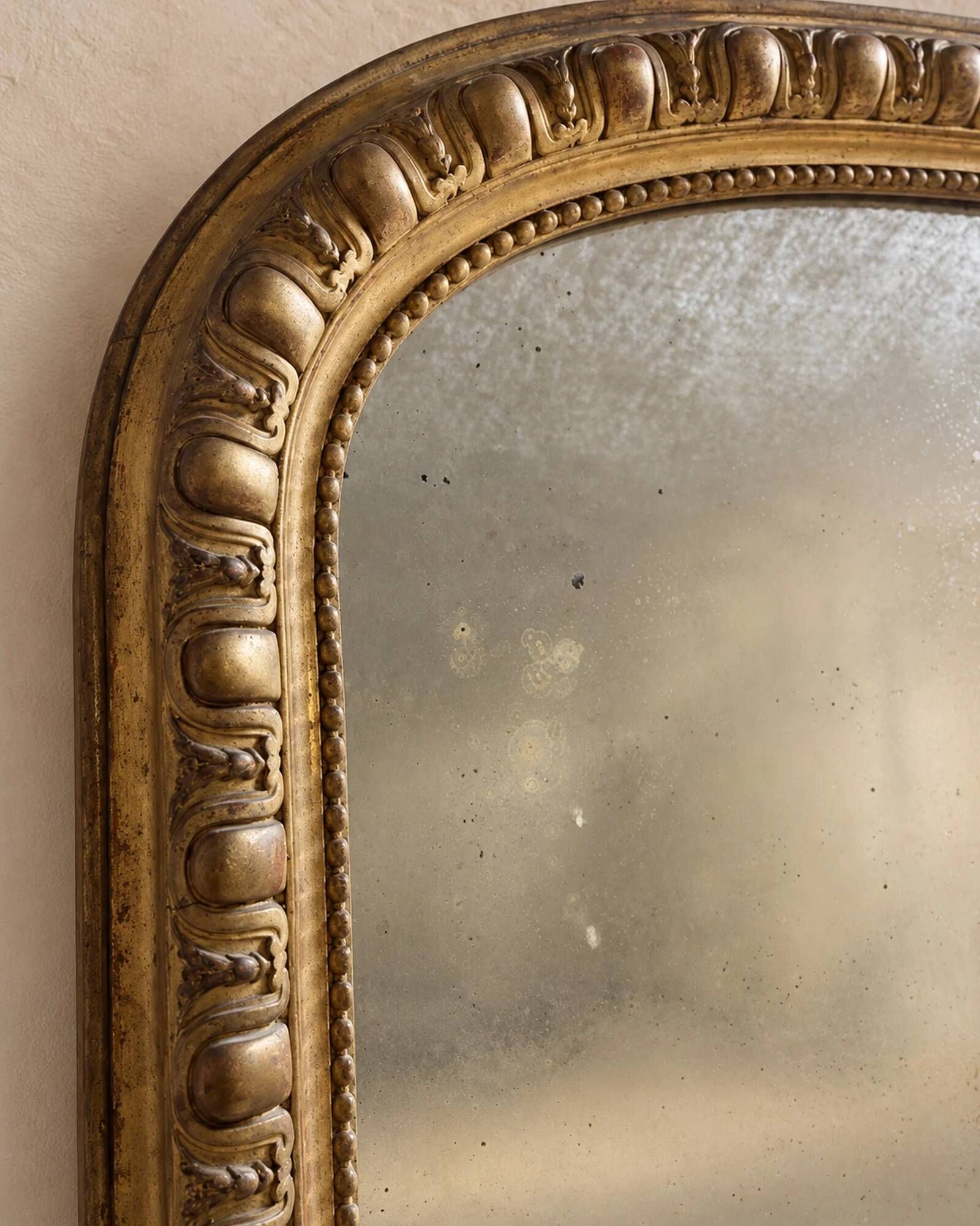 Large Louis-Philippe mirror with a gadrooned decoration — France, 19th century